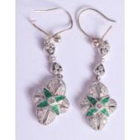 A PAIR OF ART DECO PLATINUM DIAMOND AND EMERALD EARRINGS. 5.1 grams. 3.5 cm long.