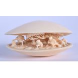 A 19TH CENTURY CHINESE CARVED IVORY CANTON CLAM SHELL Late Qing. 5 cm x 3.25 cm.