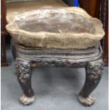 A LARGE EARLY 20TH CENTURY CHINESE FLUORITE TABLE upon a lacquered hardwood base. 70 cm x 60 cm.
