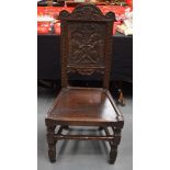 A 17TH CENTURY OAK DINING CHAIR with Tudor style floral back splat. 104 cm x 48 cm.