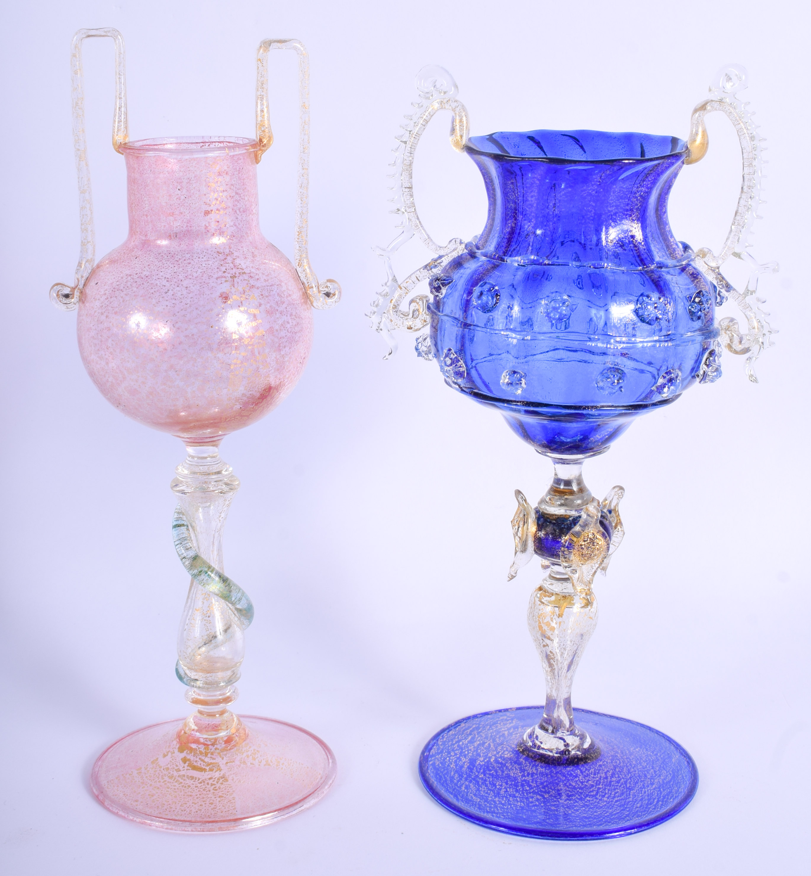 TWO VENETIAN TWIN HANDLED GLASS VASES with gold splash decoration. 21 cm high. (2)