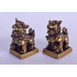 A PAIR OF CHINESE BRONZE BUDDHISTIC LION SEALS 20th Century. 3 cm x 1.5 cm.