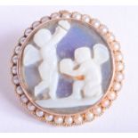 AN ANTIQUE GOLD MOUNTED CAMEO AND SEED PEARL BROOCH. 8.9 grams. 2.5 cm wide.