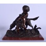 A 19TH CENTURY FRENCH BRONZE FIGURE OF A YOUNG BOY modelled holding a hunting hound. 24 cm x 22 cm.