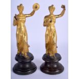 A PAIR OF EARLY 19TH CENTURY ENGLISH ORMOLU FIGURES modelled as a pair of female musicians. Figure 1