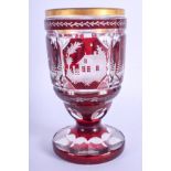 AN ANTIQUE BOHEMIAN GLASS GOBLET decorated with birds. 15 cm high.
