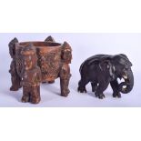 AN ANTIQUE INDIAN CARVED EBONY FIGURE OF AN ELEPHANT of unusual ribbed form, together with a Tribal