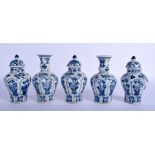 FIVE 19TH CENTURY CHINESE BLUE AND WHITE VASES Kangxi style, after a shipwreck original, painted wit