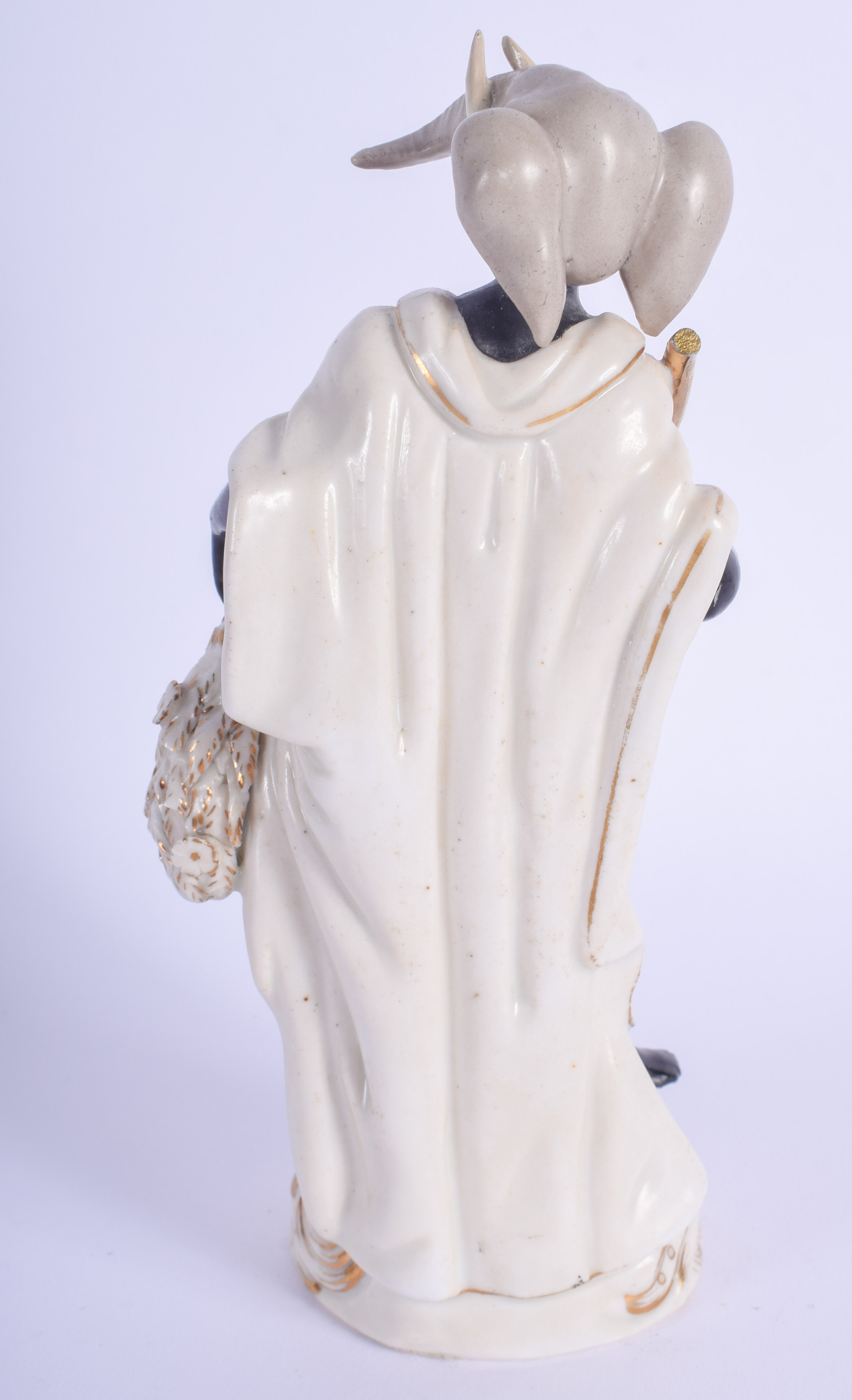 A 19TH CENTURY CONTINENTAL PORCELAIN FIGURE OF A NUBIAN MALE after an 18th century original, modelle - Image 2 of 3