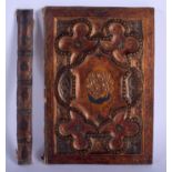 A RARE 19TH CENTURY INDIAN PERSIAN LACQUERED BOOK COVER decorated with foliage and masks. 24 cm x 1