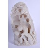A CHINESE CARVED WHITE JADE MOUNTAIN GROUP 20th Century. 12 cm x 6.5 cm.