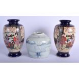 A PAIR OF JAPANESE MEIJI PERIOD SATSUMA VASES together with a ginger jar. Largest 24.5 cm high. (3)