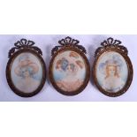 THREE EARLY 20TH CENTURY CONTINENTAL PAINTED IVORY PORTRAIT MINIATURES within gilt frames. Image 7.