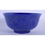 A CHINESE BLUE GLAZED BOWL 20th Century. 13 cm diameter.