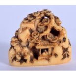 AN 18TH CENTURY JAPANESE EDO PERIOD CARVED IVORY NETSUKE in the form of pavilion in landscapes. 3 c