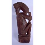 AN UNUSUAL TRIBAL CARVED HARDWOOD FIGURE OF AN ANIMAL possibly Papua New Guinea, Sepik 32 cm x 11 c