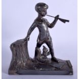 AN ART DECO SILVER PLATED WMF STYLE FIGURE OF PETER PAN modelled beside a squirrel. 19 cm x 17 cm.