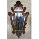 An Antique continental bevelled glass Mirror with wooden ivory inlaid frame. 108cm x 60cm