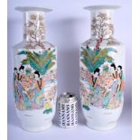 A PAIR OF EARLY 20TH CENTURY CHINESE FAMILLE ROSE PORCELAIN ROULEAU VASES Late Qing/Republic. 41 cm