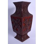 AN EARLY 20TH CENTURY CHINESE CARVED CINNABAR LACQUER VASE Qing, decorated with flowers. 24 cm high