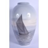 A LARGE ROYAL COPENHAGEN PORCELAIN VASE painted with boating views. 27 cm high.
