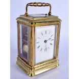 A SMALL 19TH CENTURY FRENCH BRASS REPEATING CARRIAGE CLOCK with white enamel dial. 13.5 cm inc hand