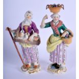 A PAIR OF GERMAN MEISSEN PORCELAIN FIGURES modelled as two females. 15 cm high.