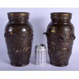 A LARGE PAIR OF 19TH CENTURY JAPANESE MEIJI PERIOD BRONZE VASES decorated in relief with birds and