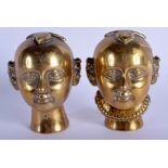A RARE PAIR OF 19TH CENTURY INDIAN HINDU BRONZE HEADS modelled as a male and female. 12.5 cm high.