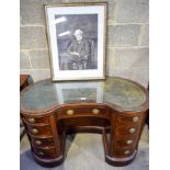 An Antique Kidney shaped Desk with glass top, once owned by Sir John Lubbock who was elected to Parl