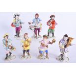 SEVEN EARLY 20TH CENTURY GERMAN PORCELAIN MONKEY MUSICIANS Meissen style. 16 cm high.