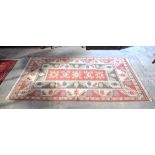 Four Oriental rugs. largest 200cm x 120cm