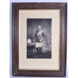 A FRAMED W & D DOWNEY FRAMED PHOTOGRAPH OF KING GEORGE V in military uniform, Thacker Spink & Co Ca