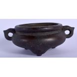 A CHINESE TWIN HANDLED BRONZE CENSER 20th century. 12.5 cm wide, internal width 7 cm.