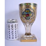 A FINE 19TH CENTURY EUROPEAN ENAMELLED GILDED GLASS GOBLET painted with floral sprays and vines. 21