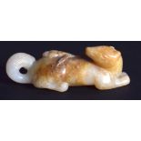 A CHINESE CARVED WHITE JADE FIGURE OF A STYLISED ANIMAL 20th Century. 5.5 cm wide.