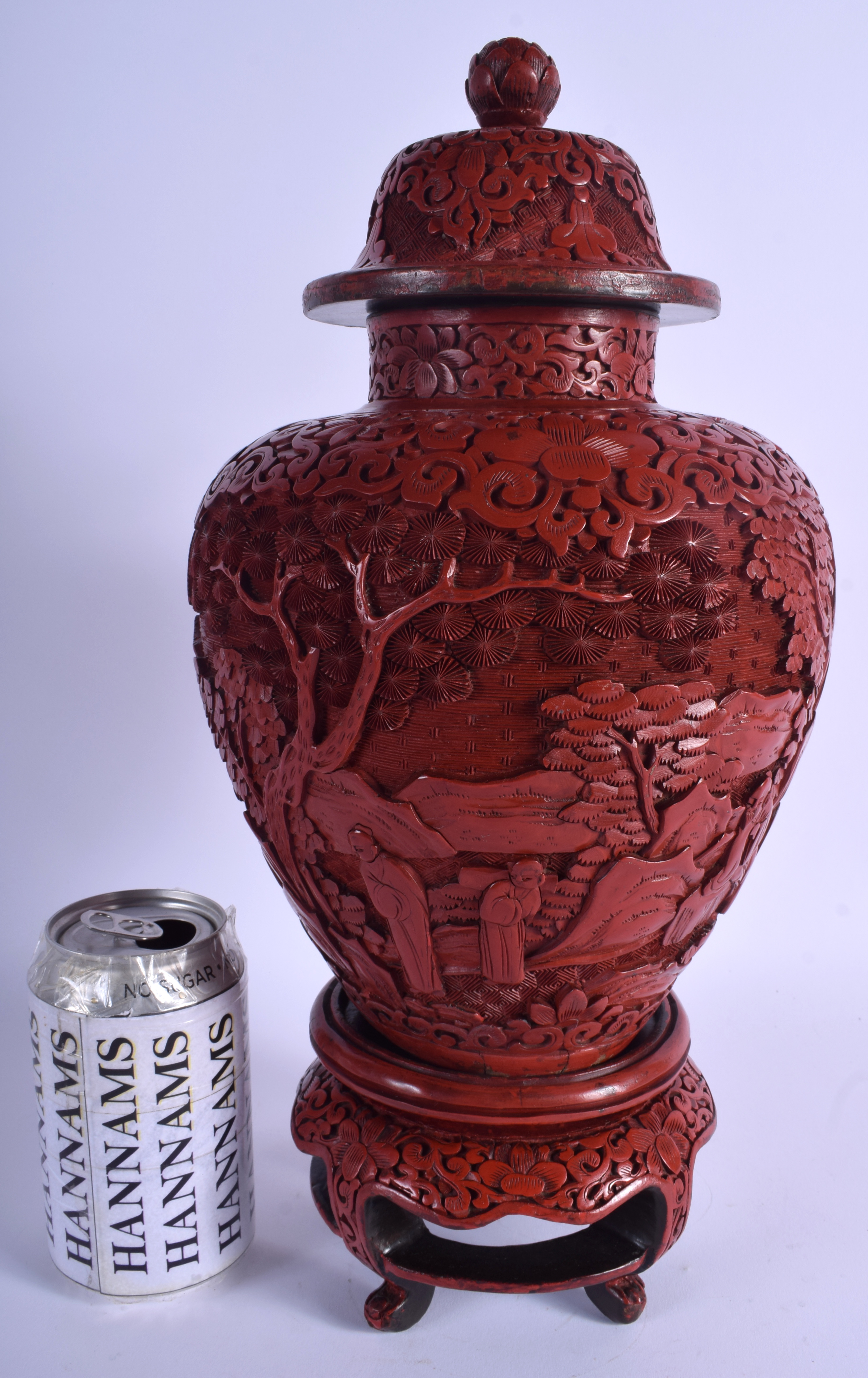 A RARE 19TH CENTURY CHINESE CARVED CINNABAR LACQUER VASE AND COVER Qing, upon a fitted stand. 37 cm