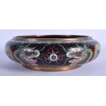 A LARGE EARLY 20TH CENTURY CHINESE CLOISONNE ENAMEL BOWL decorated with dragons. 23 cm diameter.