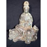 Chinese bronze Buddha seated on a beast. Buddha 28cm high