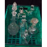 A group of glass decanters