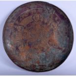 AN EARLY 10TH/12TH CENTURY COPPER SALJUK MIDDLE EASTERN DISH decorated with calligraphy. 23 cm diam
