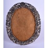 A 19TH CENTURY JAPANESE MEIJI PERIOD SILVER PHOTOGRAPH FRAME decorated with foliage. 15 cm x 18 cm.