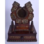 A REGENCY CARVED ROSEWOOD MOTHER OF PEARL INLAID WATCH HOLDER. 21 cm x 14 cm.