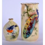 Locke Worcester vases painted with a bird, signed Wall or Lev, green globe mark. Largest 10.5cm hig