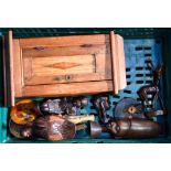A group of wooden items including a wall cabinet, figures and pictures