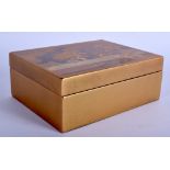 A 19TH CENTURY JAPANESE MEIJI PERIOD GOLD LACQUERED BOX AND COVER decorated with landscapes. 13 cm