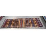 An Anatolian wool Cicim embroidered long rug. 317cm x 117cm