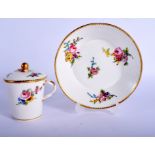 Sevres tapering cup with entwined handle and cover and stand painted with flowers date code for 178