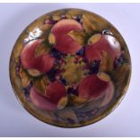 A MOORCROFT POMEGRANATE DISH. 21 cm wide.