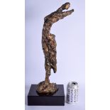 A LARGE ABSTRACT BRONZED FIGURE OF A HUMAN FORM upon a marble base. Figure 48 cm high.